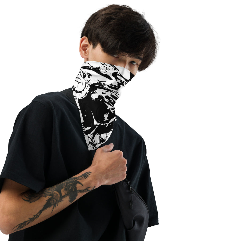 Man wearing Ink-Riot Bandana as a face covering, black and white graphic print, layered over a black oversized tee with tattoo sleeve visible